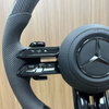 High quality Mercedes-Benz steering wheel detail shot, fine stitching leather material