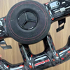 Close-up view of Mercedes sport steering wheel, ergonomic design for vehicle upgrade