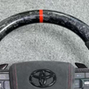 The Toyota steering wheel is installed in the cockpit of the car, perfectly fitting the interior modification accessories of Toyota