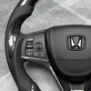 Customized Bright Carbon Fiber Steering Wheel for Crown with Leather Airbag Cover
