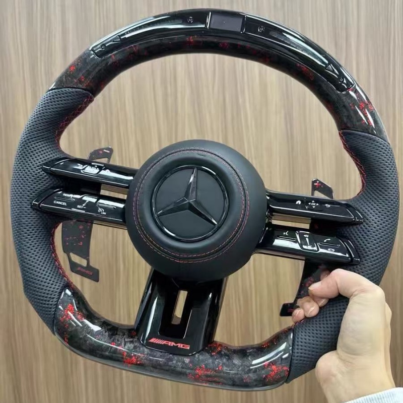 Close-up view of Mercedes sport steering wheel, ergonomic design for vehicle upgrade