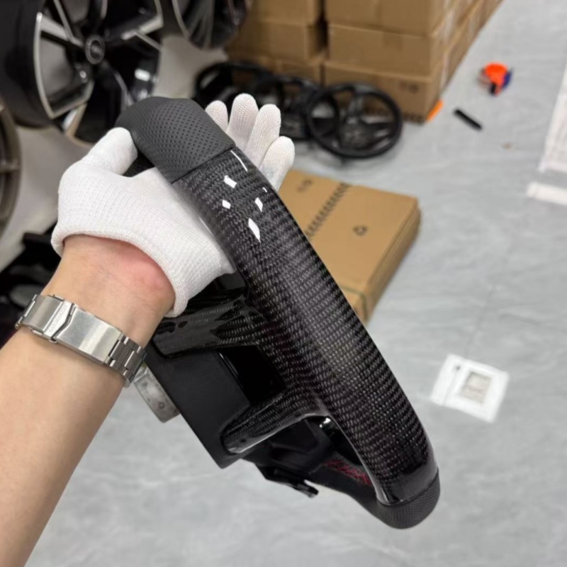 Multi functional Audi steering wheel, ergonomically designed, suitable for interior upgrades as a replacement steering wheel.