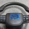 The Toyota steering wheel is installed in the cockpit of the car, perfectly fitting the interior modification accessories of Toyota