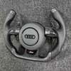Multi functional Audi steering wheel, ergonomically designed, suitable for interior upgrades as a replacement steering wheel.