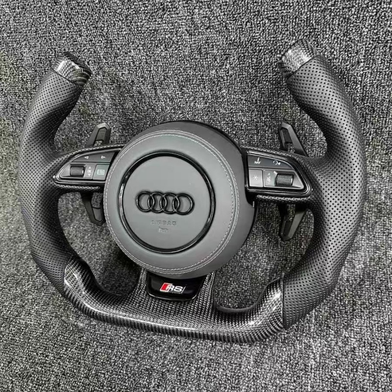 Multi functional Audi steering wheel, ergonomically designed, suitable for interior upgrades as a replacement steering wheel.