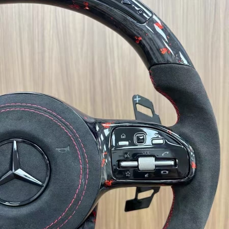 High quality Mercedes-Benz steering wheel detail shot, fine stitching leather material
