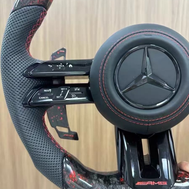 High quality Mercedes-Benz steering wheel detail shot, fine stitching leather material