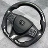 Customized Bright Carbon Fiber Steering Wheel for Crown with Leather Airbag Cover